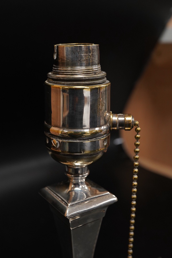 A George V silver mounted octagonal electric lamp base, with plate mounted brass top section, Mappin & Webb, London, 1929, height 22.5cm, weighted.